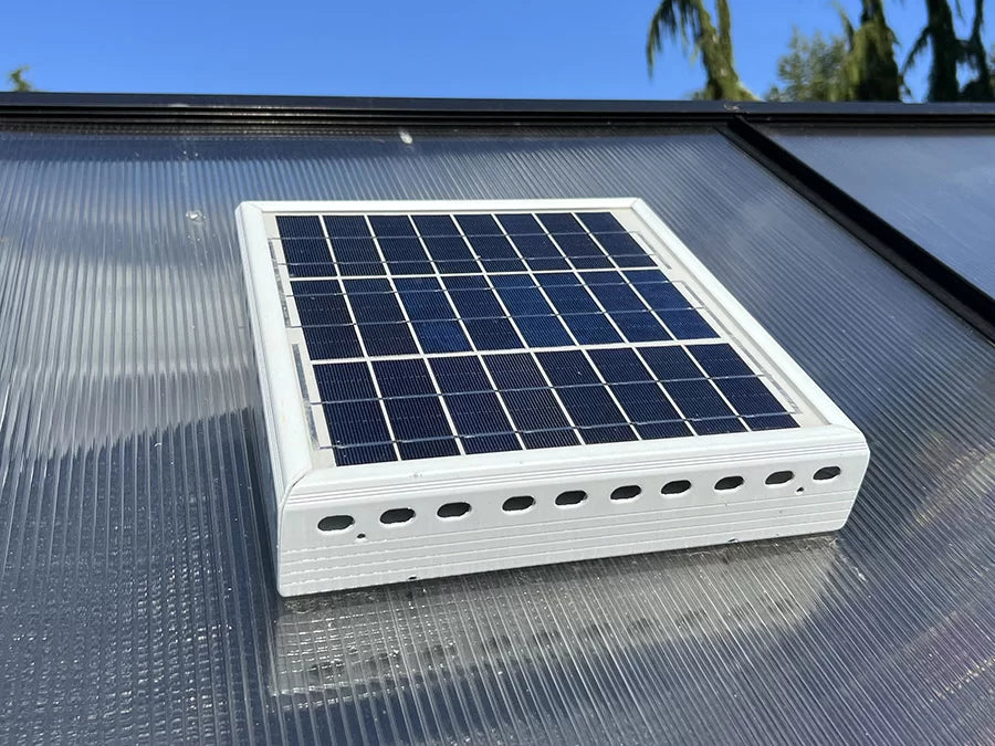 ClimaPod greenhouse solar-powered ventilation fan installed