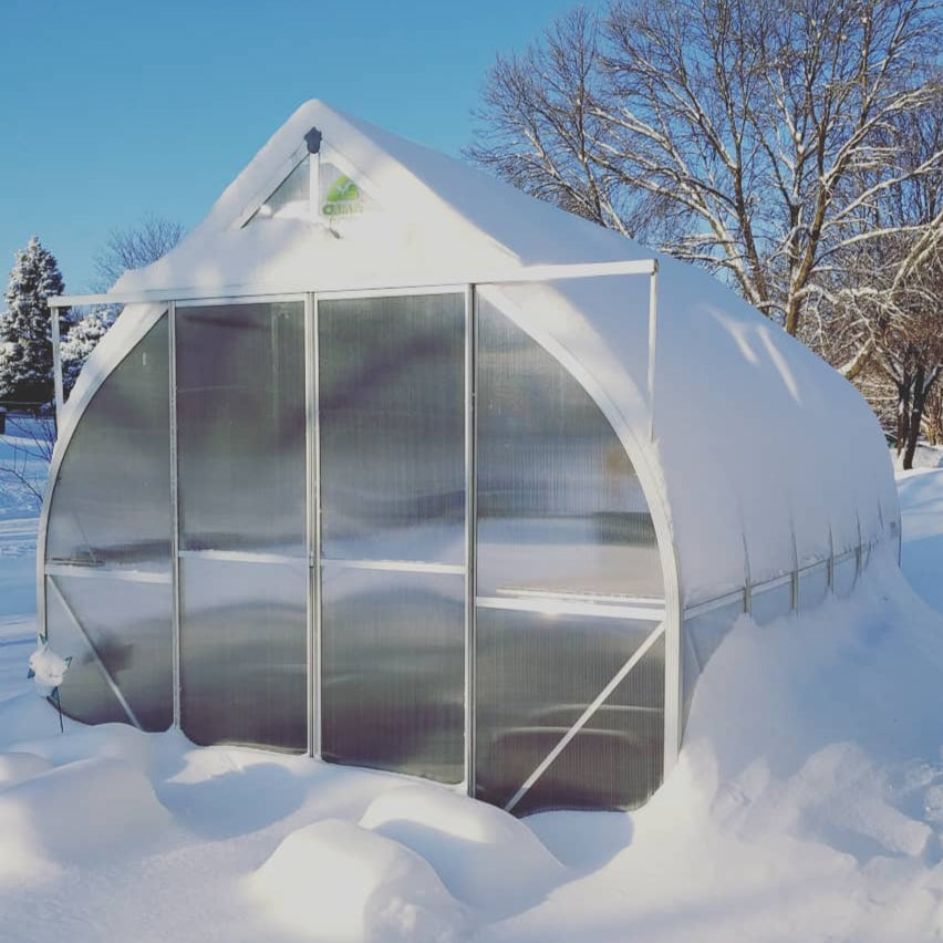 ClimaPod Virtue 9x14 Greenhouse aluminum frame, sliding doors and 6mm polycarbonate under the snow in winter