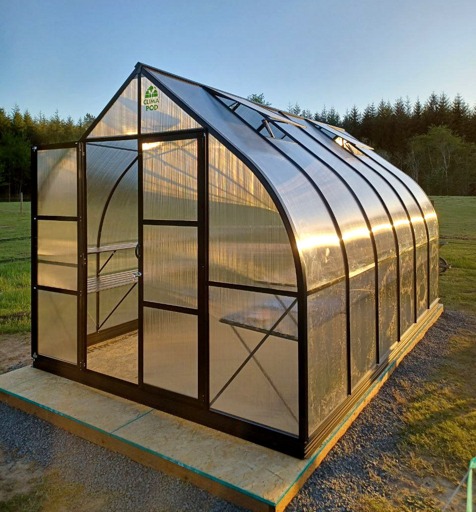 ClimaPod Virtue Black 9x14 Greenhouse with hinged doors and two-tier shelving on both sides
