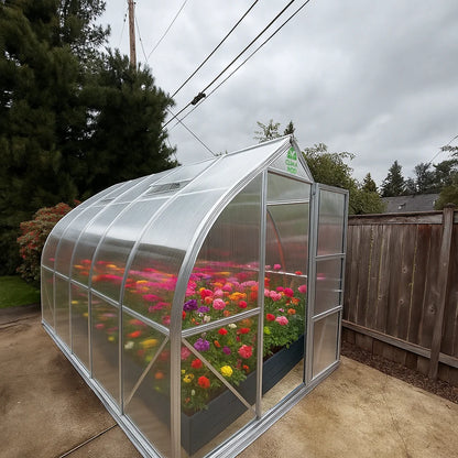 Greenhouse with colorful flowers in a backyard setting