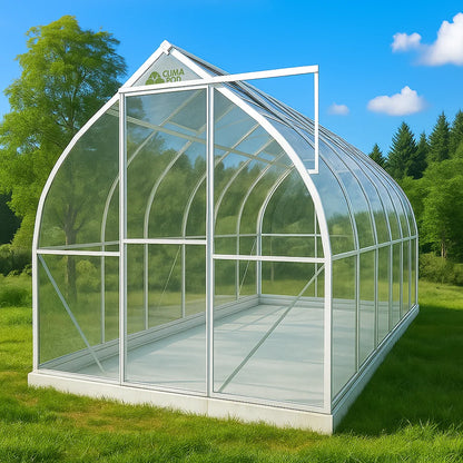 7x14 polycarbonate greenhouse with metal aluminum frame in a grassy area with trees and blue sky